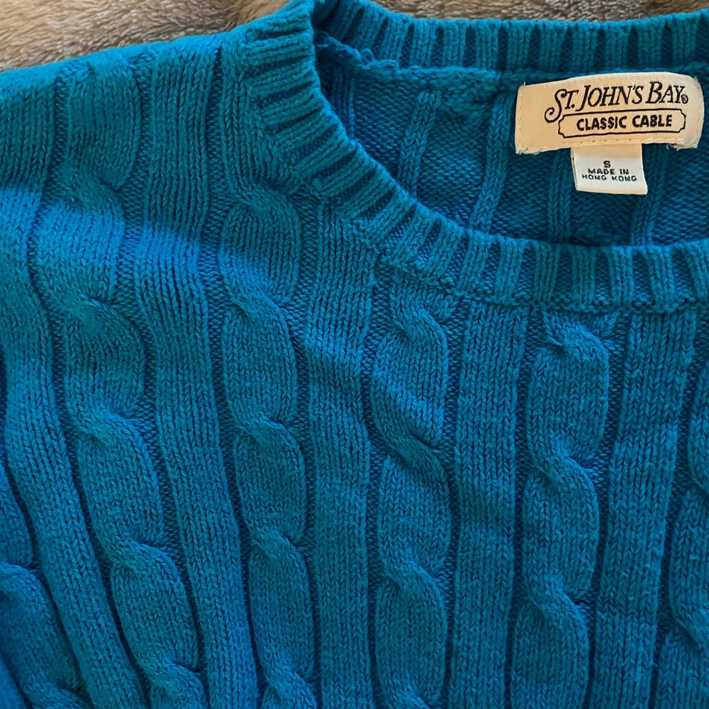 Blue knitted sweater